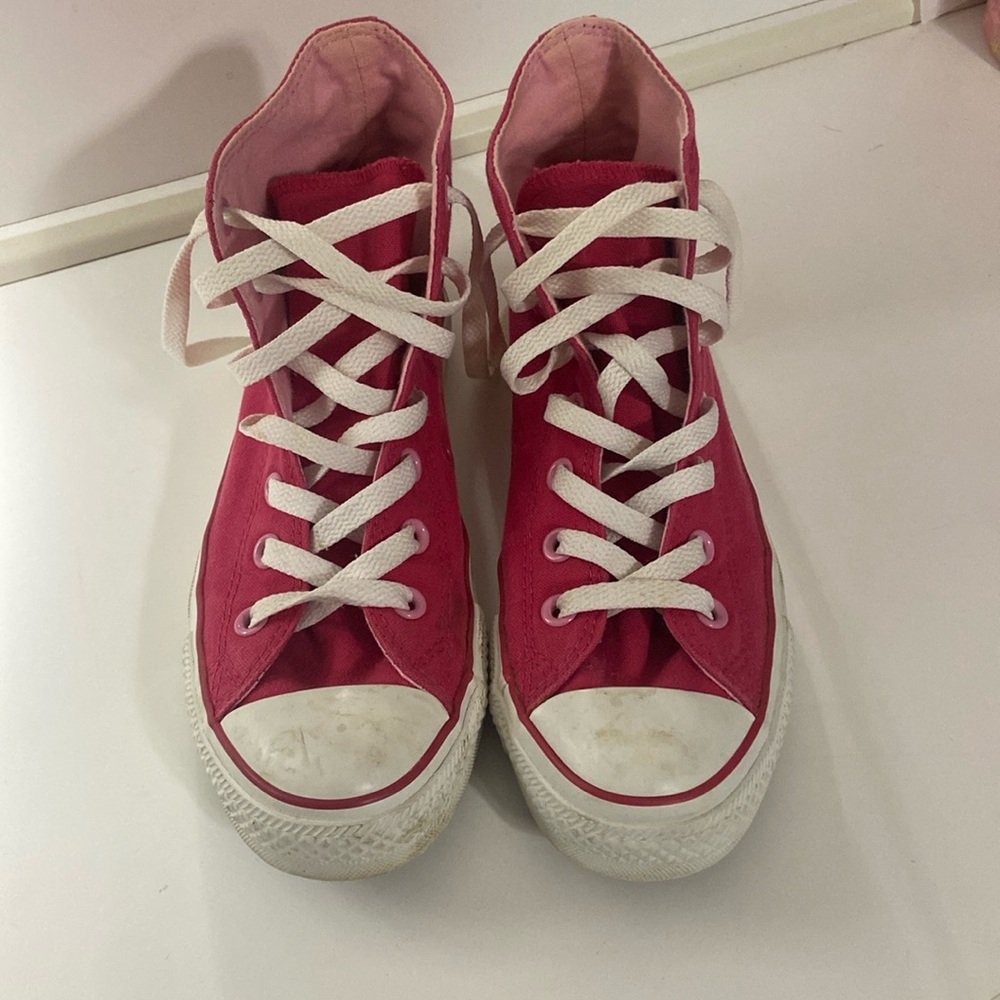 red and pink high top converse